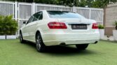 2012 Mercedes-Benz E-Class E350d — rear, left side