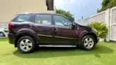 2015 Mahindra XUV500 2.2 W8 2WD — side profile, right