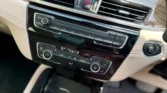 2020 BMW X1 2.0 sDrive20i xLine — climate and audio controls