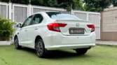 2020 Honda Amaze 1.2 E Petrol + CNG — rear, left side