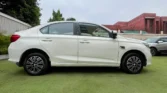 2020 Honda Amaze 1.2 E Petrol + CNG — side profile, right